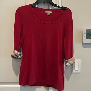 Burberry Brit size medium red blouse with checkered sleeve accents
